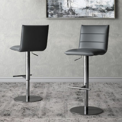c2ef45746c778306020e2c4ccf1b19ed05f4ea1bb013ad23c07e20ead9ff3445.jpg An Image of Riva Grey Faux Leather Bar Stools In Pair