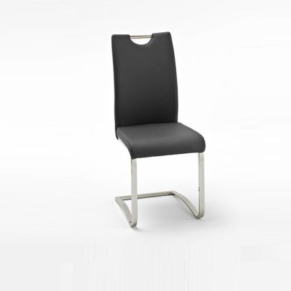 c3a79cab4ba1c8e6578d04cbd6a9447ca1d566b0e6ca33e79c91d31441611a23.jpg An Image of Koln Dining Chair In Black Faux Leather With Chrome Legs