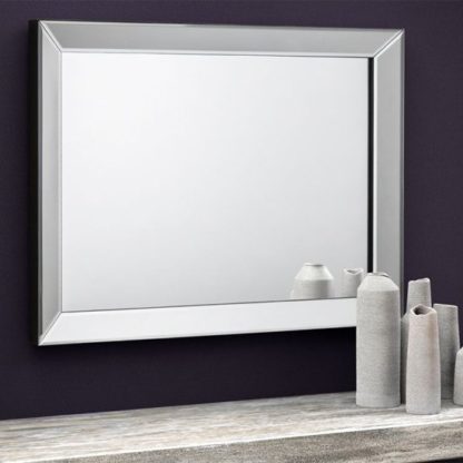 c6ee09d06e7b5bce5480349fa2367ee9f48c78df186a4c1ebf7885cd01aa77f7.jpg An Image of Soprano Wall Bedroom Mirror