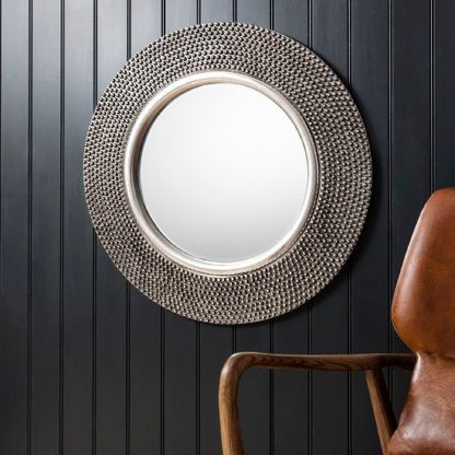 c873d61e5638b25c18279931d15a90a8e9796f2682fbf7caf675c25c4bb8ae19.jpg An Image of Whitton Wall Mirror Round With Bobble Effect in Pewter Finish