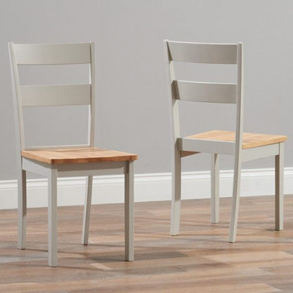 ca46579bd722ad5831f7cdcba442233b8bf6899c9fb716ac551b16233488db8f.jpg An Image of Antlia Oak And Grey Wooden Dining Chairs In Pair
