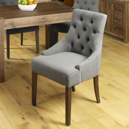 d0d17e0e29120a611401b66eab3ec6bbdbd0230bcfd616f4a0b3f2f337aa72e2.jpg An Image of Harry Dining Chair In Slate With Walnut Legs In A Pair