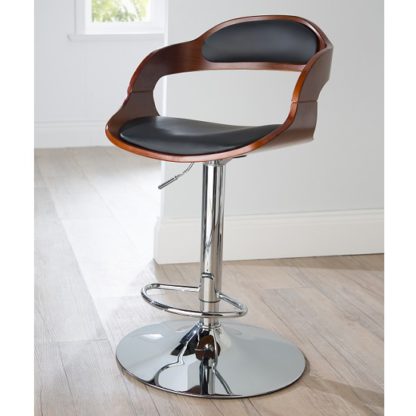 d280009b0d234ece76d371947a1e05f361e9d8fbe62f1b11f6dd98b0eb254f9e.jpg An Image of Fairmont Bar Stool In Black PU And Walnut With Chrome Base