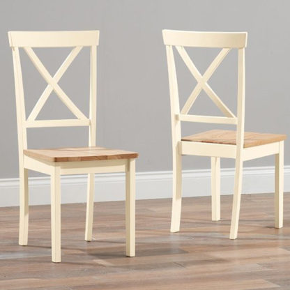 An Image of Chertan Wooden Oak And Cream Dining Chairs In Pair