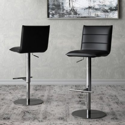 dd2c57a3349110b2c47792136c48d580f55681b7451e031cb6ebd342c0d1e901.jpg An Image of Riva Black Faux Leather Bar Stools In Pair