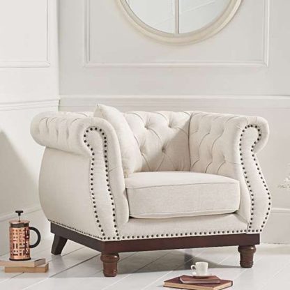 ddf09ea1d4e73825308b0a3c0f5a1b00d056f2058605fc6b7f80e34b09baad4f.jpg An Image of Morava Linen Armchair In Ivory