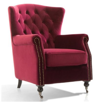 An Image of Reedy Velvet Wingback Chair In Berry With Metal Castor