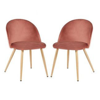 An Image of Swart Velvet Dining Chairs In Pink With Oak Legs In A Pair