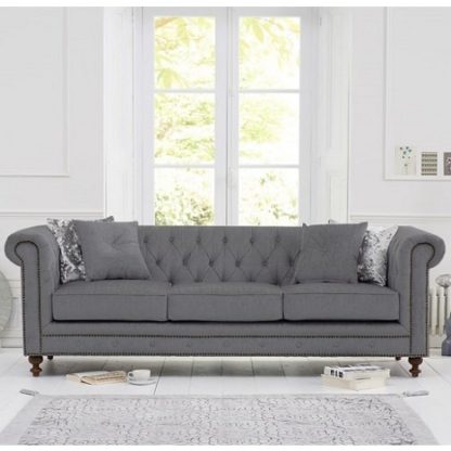 eb2bffec343d5bcdf74feccc3aabdaaf387b0b2a8125b09dd31b4776a1e9178d.jpg An Image of Mentor Fabric 3 Seater Sofa In Grey Linen With Dark Ash Legs