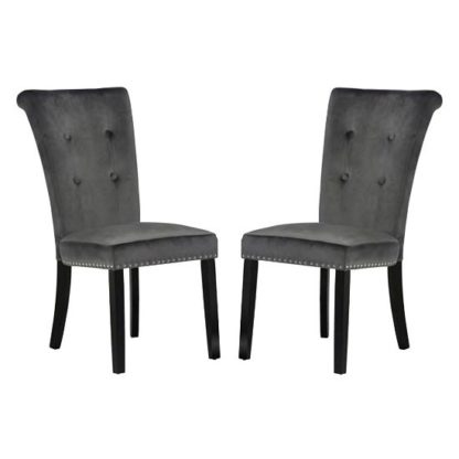 eb534d80a0c0b569b11ab864825f4e126d254e191c4a6b2ad731bc6c2cbb61c8.jpg An Image of Wodan Velvet Dining Chair In Grey With Black Legs In A Pair