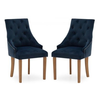An Image of Vanille Velvet Dining Chair In Blue With Oak Legs In A Pair