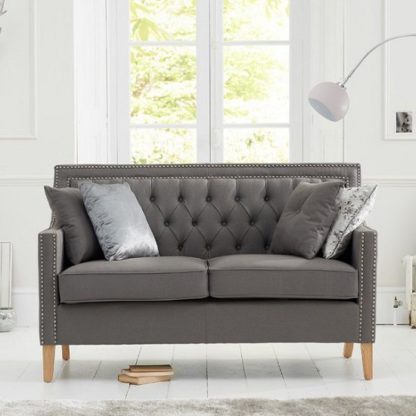 ebd6411dd64a0ea402e391f5a8096a2284f39398a220bf2cb3bd0b189a4de2df.jpg An Image of Bellard Fabric 2 Seater Sofa In Grey And Natural Ash Legs