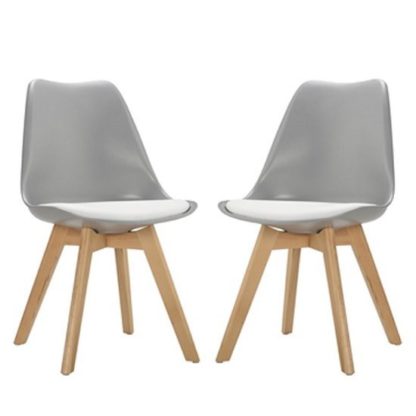 f0682ee1d21d457f8e8d37b13df5d0a6a61a61aabab87e0a28d902339a43f9df.jpg An Image of Sigmon Dining Chair In Matt Grey With White PU Seat In A Pair