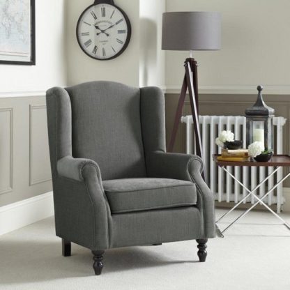 f09defa2ebe64b453ccef355689a3370f7e8e5cbc0adabfa0c844c1ed5dab360.jpg An Image of Jaxon Sofa Chair In Grey Fabric With Wooden Legs