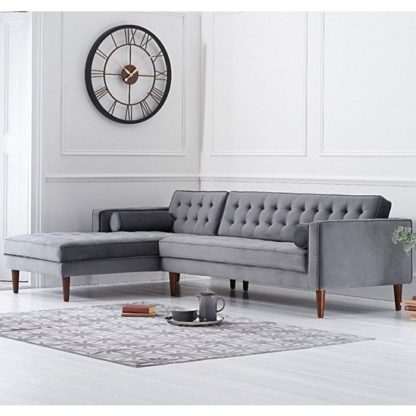f17c86283bd23d16a6610d9354eefe4d5d21627cd270a6c51c7a2a26afdeca2d.jpg An Image of Ogma Velvet Left Facing Chaise Sofa Bed In Grey