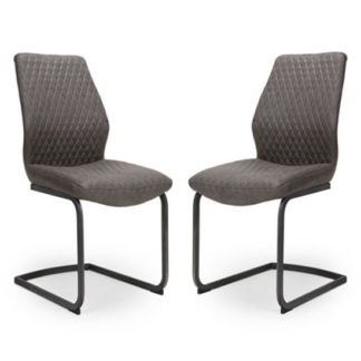 An Image of Charlie Grey Faux Leather Dining Chairs In A Pair