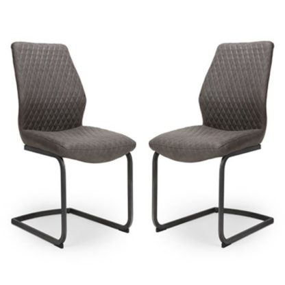 An Image of Charlie Grey Faux Leather Dining Chairs In A Pair