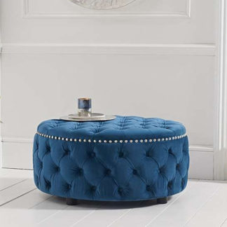 An Image of Aniara Velvet Round Footstool In Blue