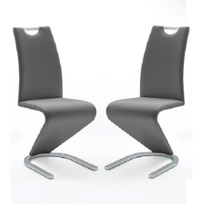f5e7a44edcde09d26fa05b42c408d13e2bc37c5882864f09ff775652160064eb.jpg An Image of Amado Z Grey Faux Leather Dining Chair In A Pair