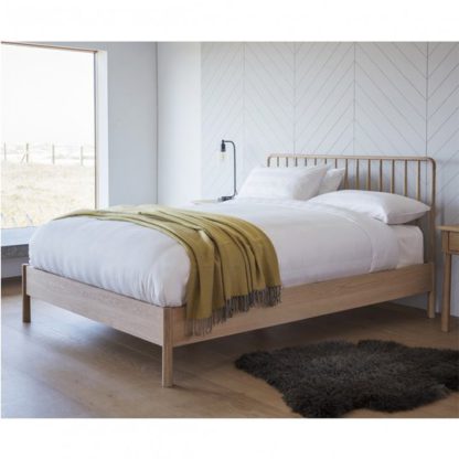 An Image of Wycombe Spindle Double Bed In Oak