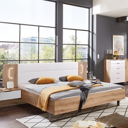 15cc613f92a52e5a29f5c20d2a226ebe0a7f6ab22996f1f10a82093695196003.jpg An Image of Shanghai Wooden Double Bed In Artisan Oak And White