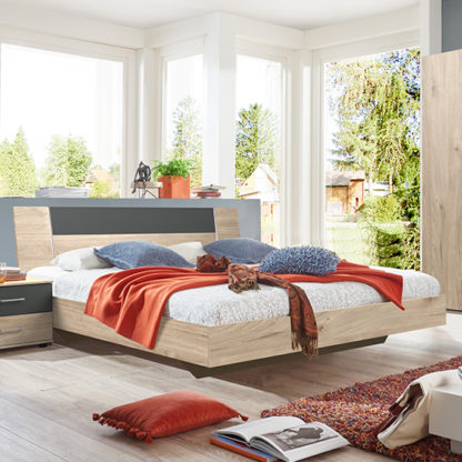 37bbfb375c69631e5d997236f94aa8c339537097b9e606dd2d4da3b8b1d6af28.jpg An Image of Jenny Wooden Double Bed In Hickory Oak And Graphite