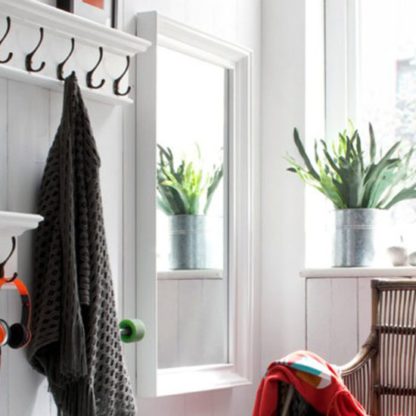 7cf88e60f943b61f64de69408723860e9547ec560bea59b334e1d4ba66954899.jpg An Image of Allthorp Profile Bedroom Mirror In Classic White