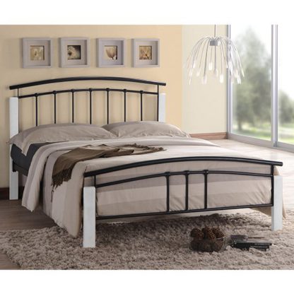 ca7255341d7bfe09db31cdb9cba415cbc439ce6b091fef9cb11697241aa37530.jpg An Image of Tetron Metal King Size Bed In Black With White Wooden Posts