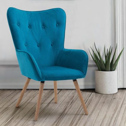 2c80f6103f1815ebd9d56e146d078ca636725cb543bc85ae47486a44160c5f8b.jpg An Image of Willow Sapphire Velvet Fabric Chair