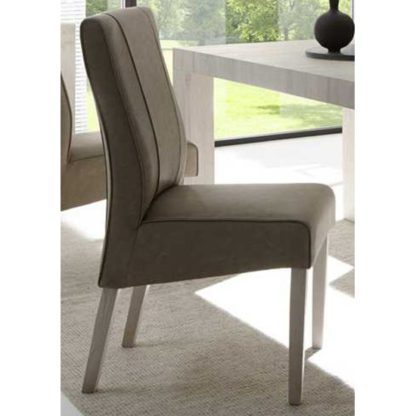 a8bc9b1af6cb3058ba657646b27cce918f0fb34f953a102c6d1576e62aa47f77.jpg An Image of Miko Faux Leather Dining Chair In Beige