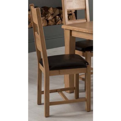 acbc71b8a72ddbc153df8a75716d9451ebf9d6aa2c38099ca5309cfcb962a113.jpg An Image of Brex Brown Leather Seat Dining Chair In Natural