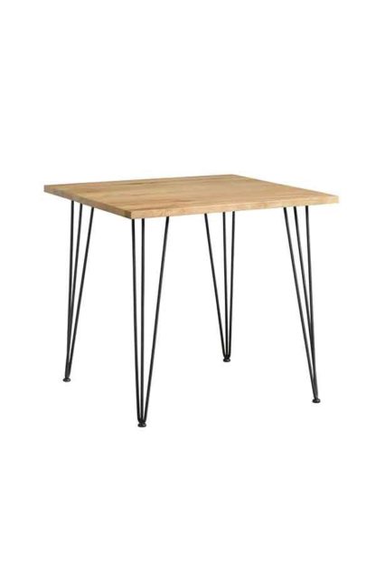 f96f38f7790a9291f0010a4ac1ff8b36bae8b4be9ee1ddaebb26eac68ed2e751.jpg An Image of Felix Industrial Cafe Table - Solid oak and steel