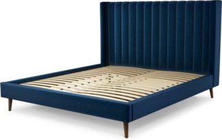 An Image of Custom MADE Cory Super King size Bed, Regal Blue Velvet with Walnut Stained Oak Legs