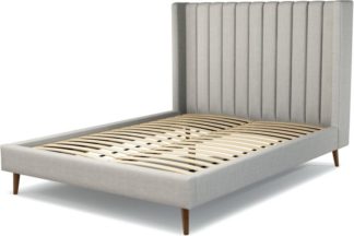 An Image of Custom MADE Cory King size Bed, Ghost Grey Cotton with Walnut Stained Oak Legs