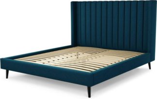 An Image of Custom MADE Cory Super King size Bed, Navy Wool with Black Stained Oak Legs