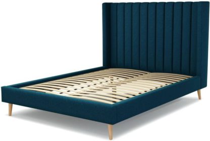 An Image of Custom MADE Cory King size Bed, Navy Wool with Oak Legs