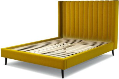 An Image of Custom MADE Cory King size Bed, Saffron Yellow Velvet with Black Stained Oak Legs