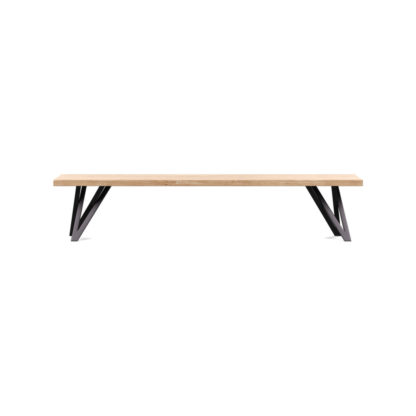 69e0d7ad21613fdee4848a6cba5643bf7ea31a6c66dd1a64e20d1b15a1ef9158.jpg An Image of Heal's Vienna Bench 160x35cm Blonde Oiled Oak Natural Edge Filled