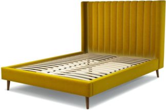An Image of Custom MADE Cory King size Bed, Saffron Yellow Velvet with Walnut Stained Oak Legs