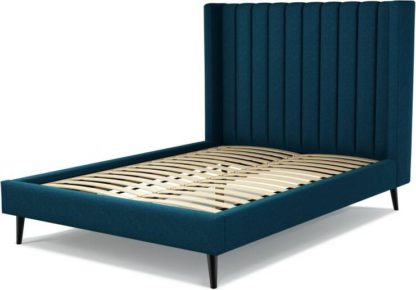 An Image of Custom MADE Cory Double size Bed, Navy Wool with Black Stained Oak Legs