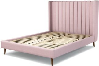 An Image of Custom MADE Cory King size Bed, Tea Rose Pink Cotton with Walnut Stained Oak Legs