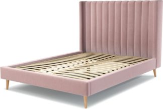 An Image of Custom MADE Cory King size Bed, Heather Pink Velvet with Oak Legs