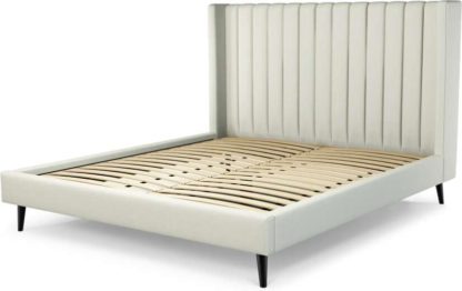 An Image of Custom MADE Cory Super King size Bed, Putty Cotton with Black Stained Oak Legs
