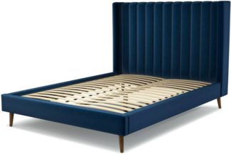 An Image of Custom MADE Cory King size Bed, Regal Blue Velvet with Walnut Stained Oak Legs
