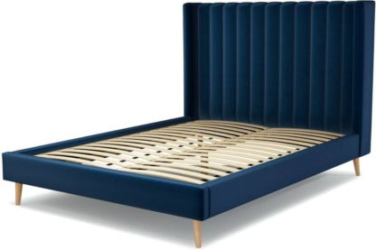 An Image of Custom MADE Cory King size Bed, Regal Blue Velvet with Oak Legs