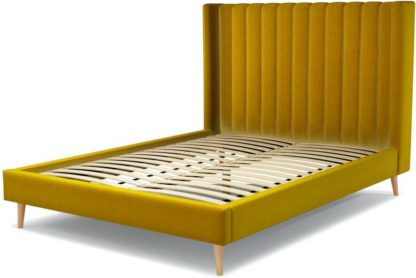An Image of Custom MADE Cory King size Bed, Saffron Yellow Velvet with Oak Legs
