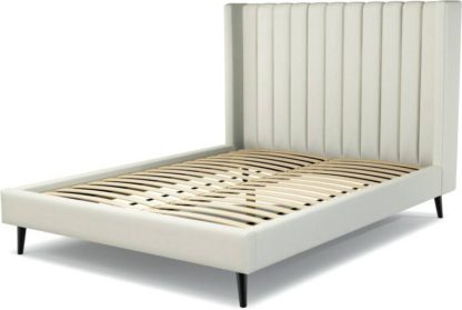 An Image of Custom MADE Cory King size Bed, Putty Cotton with Black Stained Oak Legs