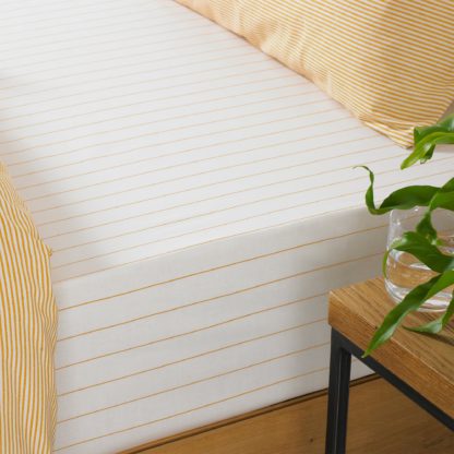 An Image of Holbury Ochre Stripe 100% Cotton Fitted Sheet Yellow and White