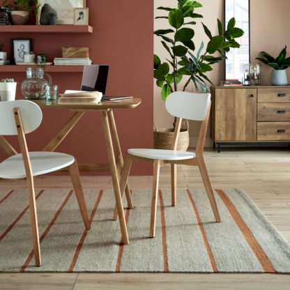 0582e235d58df8a8cff4ce02ab02b0bc735cf621e12e70b65437fac482087318-1.jpg An Image of Terra Stripe Flatweave Rug Green