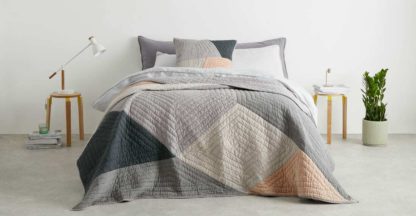 05cf07a901c3cc4b9504c9415e37b1b910d86f8c3343fa26e7f397129c9d9b78.jpg An Image of Bloco Patchwork Bedspread, Pink & Grey